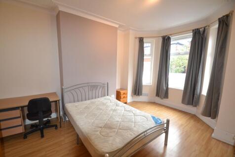 Bright and spacious single bedroom featuring mu...