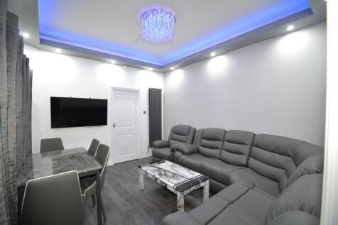 Modern and stylish living room featuring a larg...