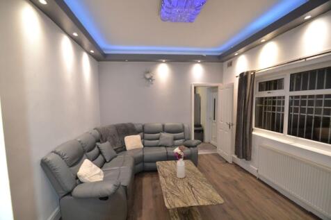 Contemporary living room with a comfortable gre...