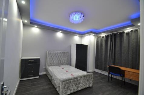 Modern double bedroom with stylish upholstered ...