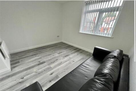 Bright, freshly renovated living room with mode...