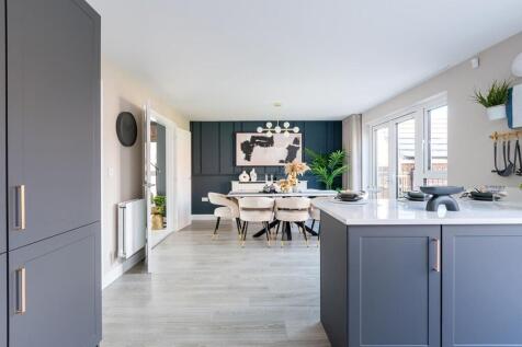 A large open plan kitchen/dining area is the hub of this family home