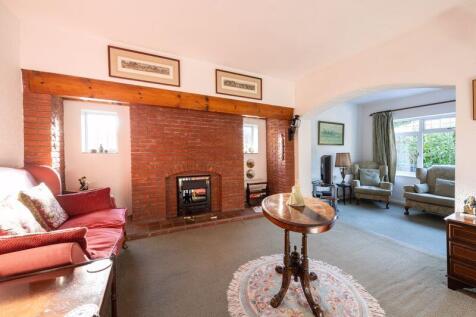 LOUNGE AREA with INGLE NOOK FIREPLACE