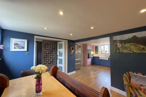 Dining area showing the hall and through to the ki