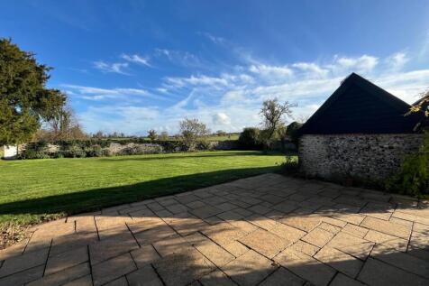 Patio with views over rear garden