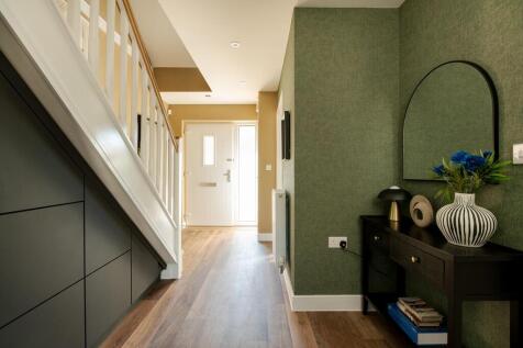 A welcoming hallway with cloakroom and storage space
