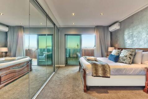 Main bedroom opens onto private deck