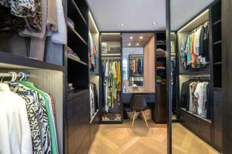 Walk-in dressing room.  Oggie floors.