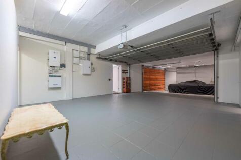 2 x Double garages.  Automated doors.  Alarm system.  