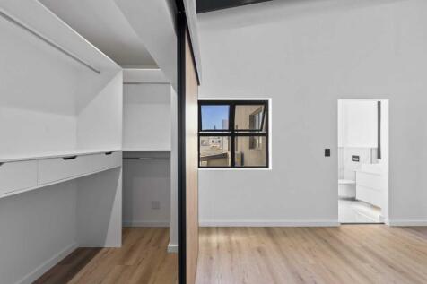 Second bedroom with walk in wardrobe