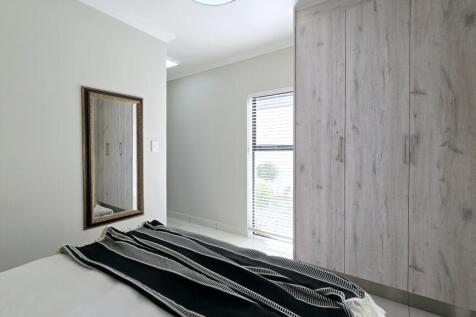 BEDROOM 1 BUILT IN CUPBOARDS