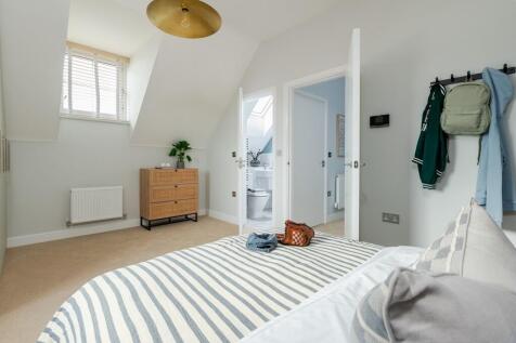 Bedroom 2 has an airy feel