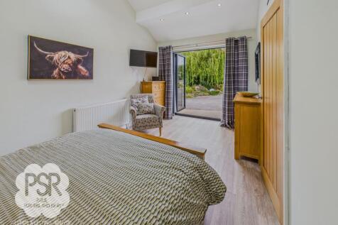 Annexe Bedroom with Bifold Doors
