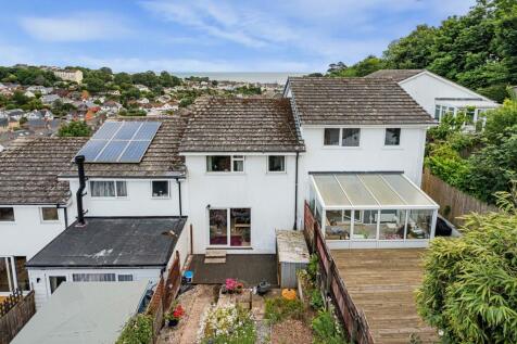 Rear of property witrh sea views in the back ground