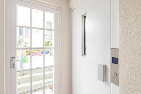 Door to lift and communal garden