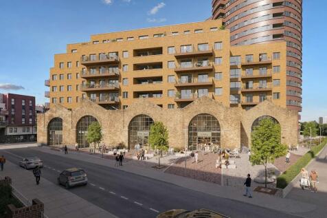 The tram shed arches restoration sits central to Rivermark's bustling plaza