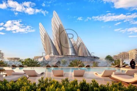 A futuristic architectural complex with tall, slee