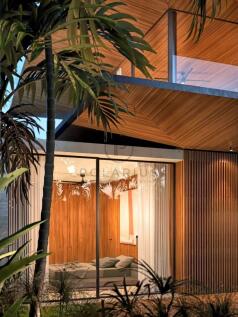 Modern architectural house with large glass panels