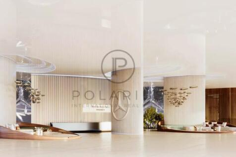 The image shows a modern, elegant reception area w
