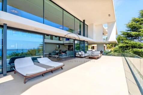 Modern luxury house with a spacious terrace, glass