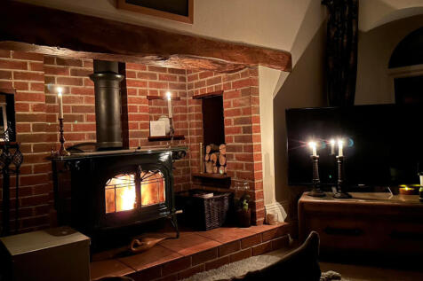 Inglenook Fireplace with log burner