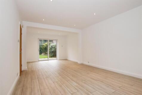 OPEN PLAN THROUGH LOUNGE/DINING ROOM