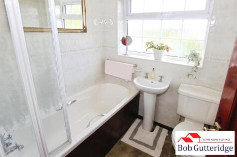 FULLY TILED BATHROOM