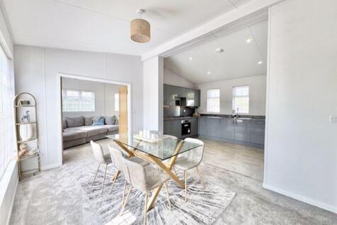 Dining to kitchen and lounge