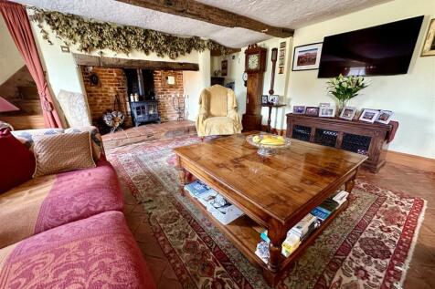 lounge with woodburner.JPEG