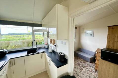 kitchen to rear aspect with views.JPEG