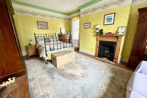bedroom one with fireplace