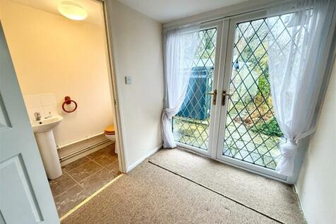 bedroom and en suite cloakroom