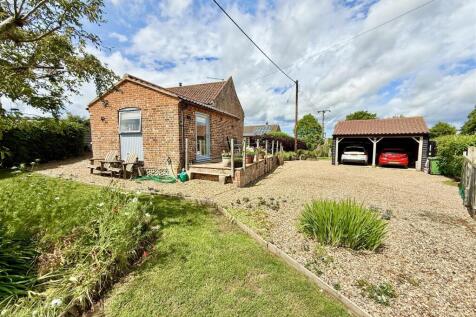 rear aspect and driveway