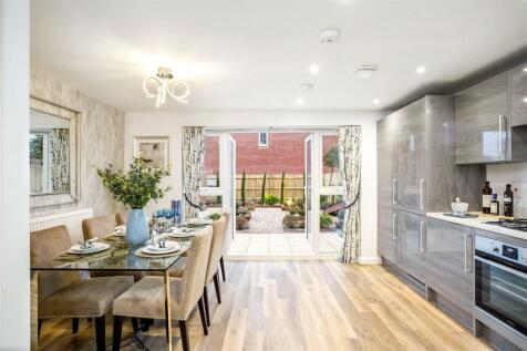 Dining Room Hersham - The Dining Room Hersham Food Drink : The kitchen/dining room features french doors that open out onto the garden and integrated appliances.