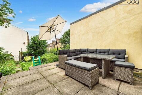 Rear Garden with flagged seating area