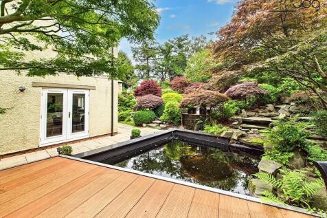 Coy fish pond and seating area