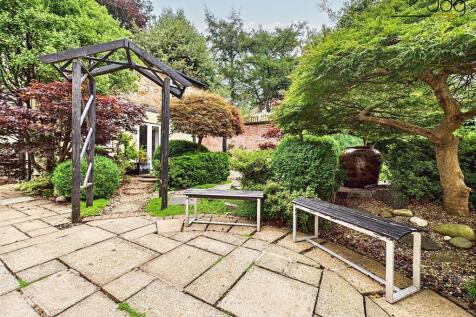 Landscaped Japanese style garden and seating area