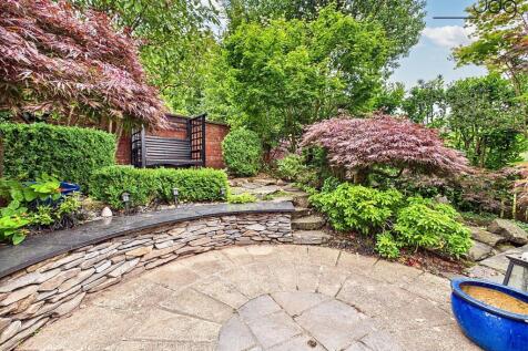 Landscaped Japanese style garden and seating area