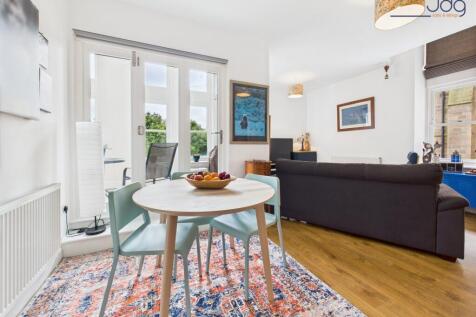 Open Plan Kitchen, Living, Dining with entrance to the balcony