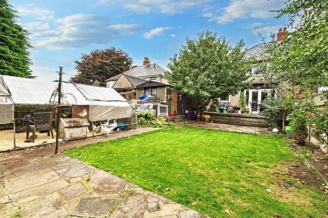 Spacious Garden with mixture of lawn, flags and decking