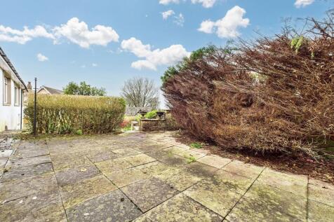 Wrap around Garden with great views and flagged area.