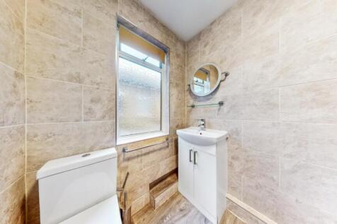 Fully tiled bathroom combined W.C