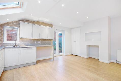 Full width reception, open plan kitchen