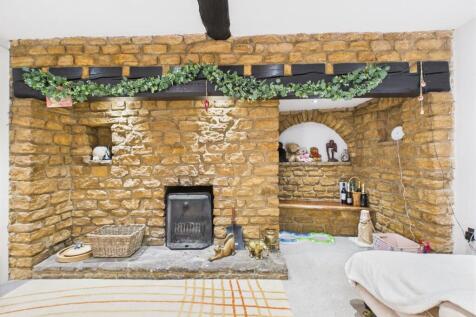 Stone Inglenook with an open fire