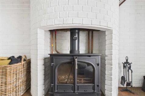 Wrought-iron log-burning stove