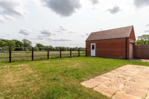 Rear Outlook and Detached Garage