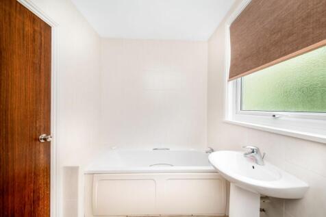 BEDROOM ONE EN-SUITE BATHROOM