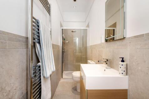 BEDROOM ONE EN-SUITE SHOWER ROOM