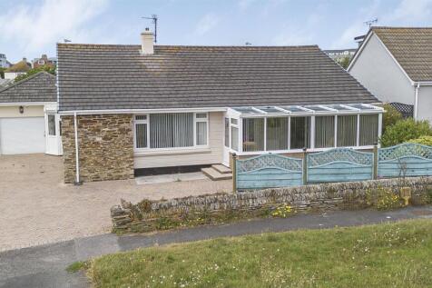 OUTSIDE TO THE FRONT OF THE PROPERTY