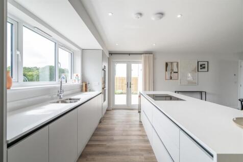 7. Kitchen with access to enclosed rear garden.jpg